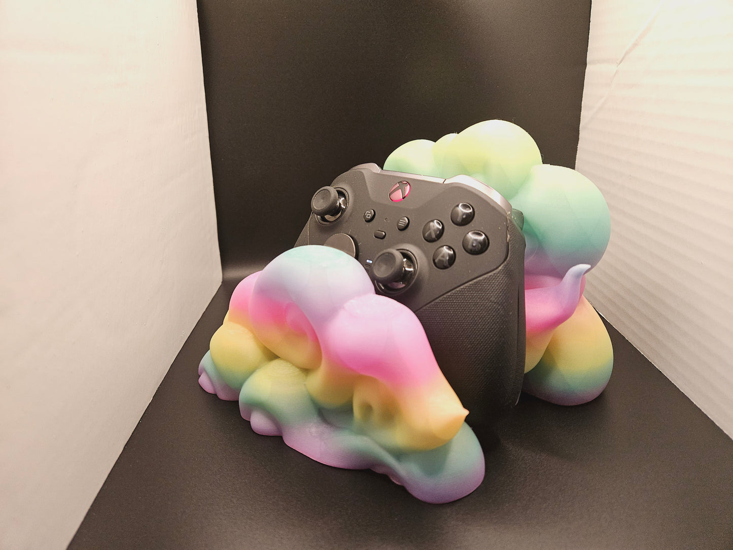 Cloud stand for gaming controllers.